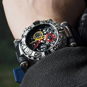 Close-up of a detailed mechanical wristwatch on a person's wrist with a blurred background