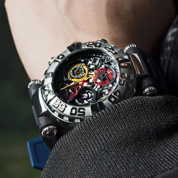 Close-up of a detailed mechanical wristwatch on a person's wrist with a blurred background