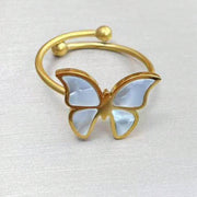 Detailed view of 18K gold-plated butterfly ring with white enamel wings from the 18K Butterflies Jewelry Set, adjustable and stylish.