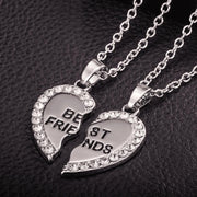 Silver-toned Custom Couple Necklaces - BondedHearts™ Heart Set with rhinestone border and 'Best Friends' engraving on each half.