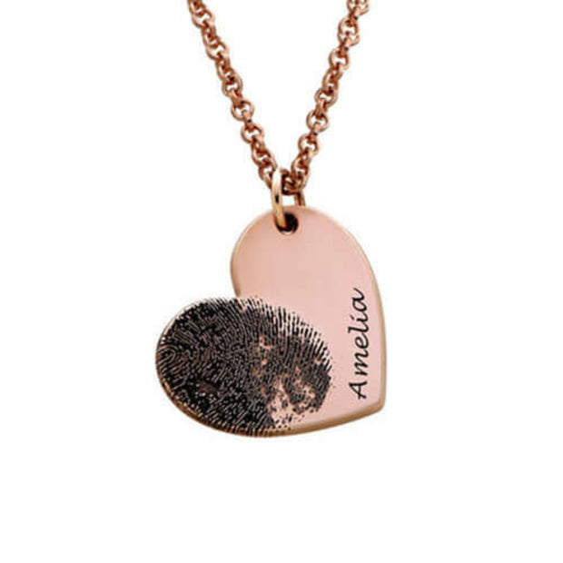 Rose gold Fingerprint Heart Necklace engraved with 'Amelia', personalized memorial jewelry with fingerprint detail.
