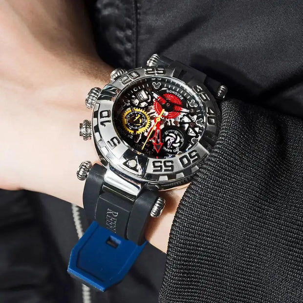 Close-up of a person wearing a detailed wristwatch with a blue strap.