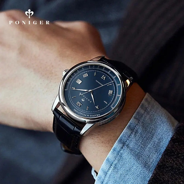 Poniger watch on a person's wrist with a blurred background