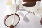 Detail view of iimo Tricycle (Classic Version) footrest and front wheel, emphasizing safety and comfort in toddler riding toys.
