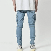 Light blue cargo pants worn by a person on a white background
