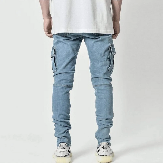 Light blue cargo pants worn by a person on a white background